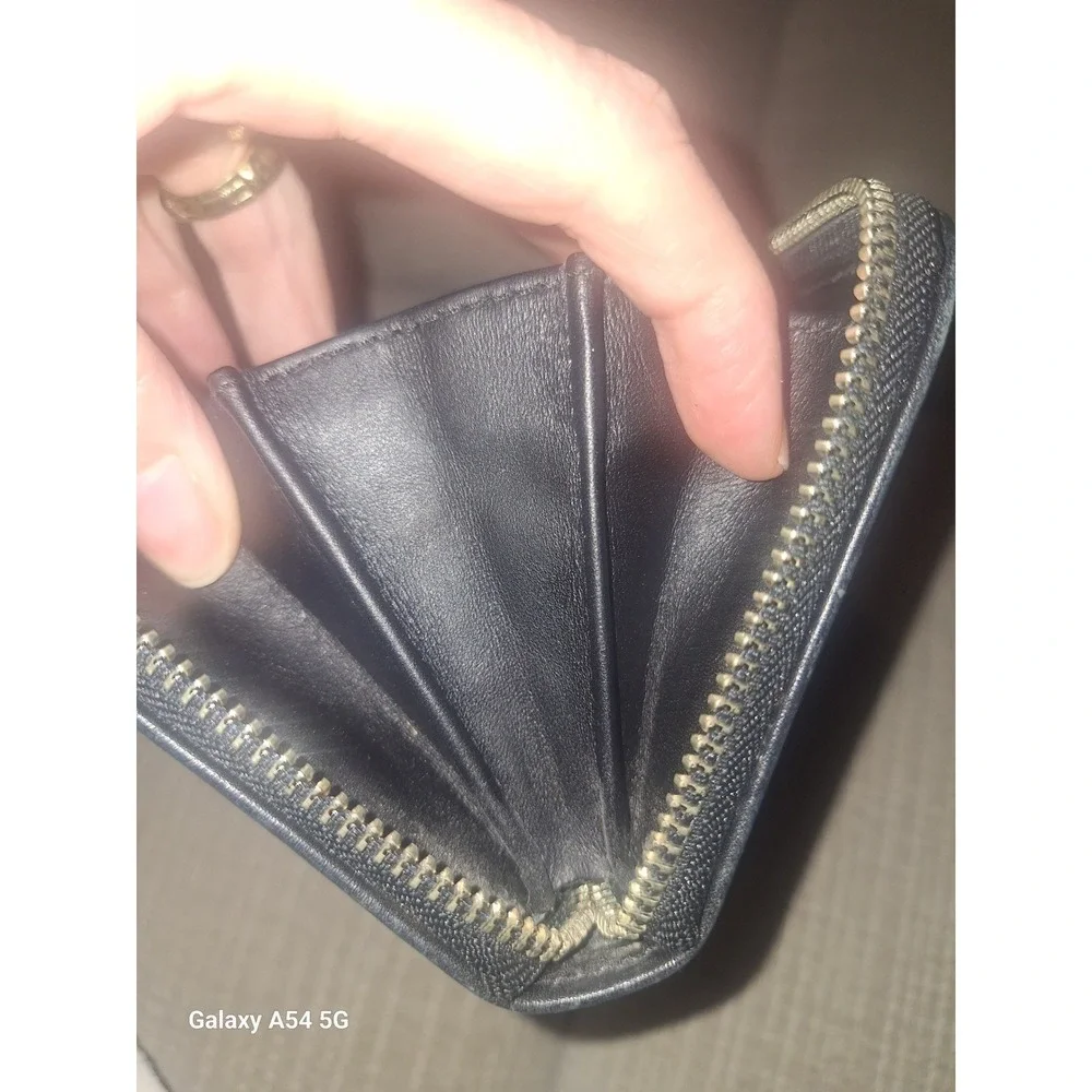 Coach Black Pebbled Leather Zip Around Wallet with Silver Interlocking C Logo